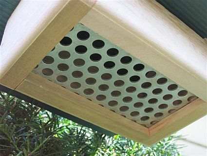 Nuthatch Upside Down Feeder - Screened Bottom holds shelled peanuts and nut mixes.